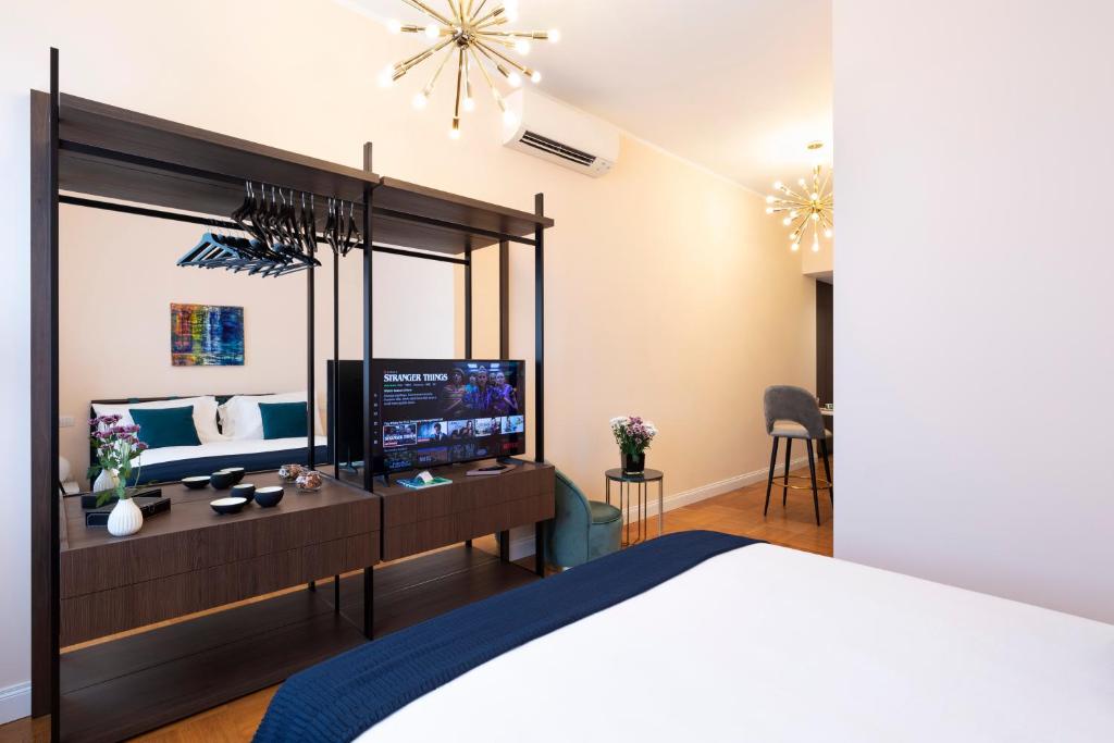 Posteľ alebo postele v izbe v ubytovaní Milano Manzoni CLC Apartments