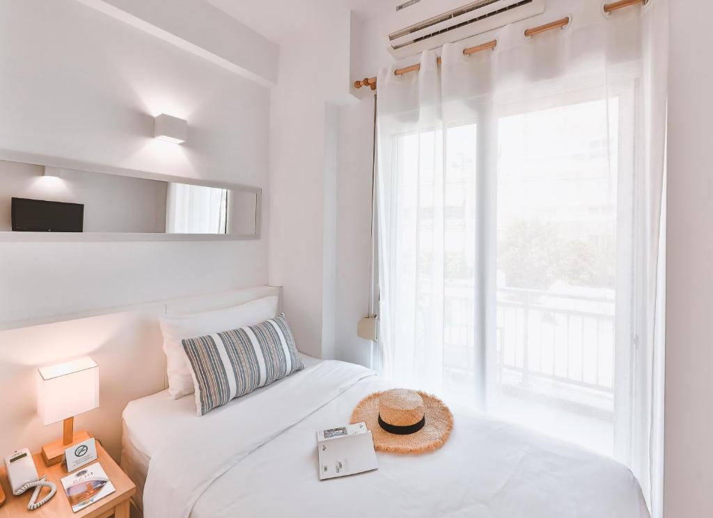Postel nebo postele na pokoji v ubytování Dias Hotel