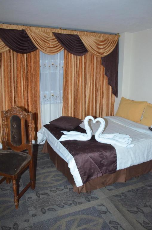 Postel nebo postele na pokoji v ubytování Hotel Bonaventure