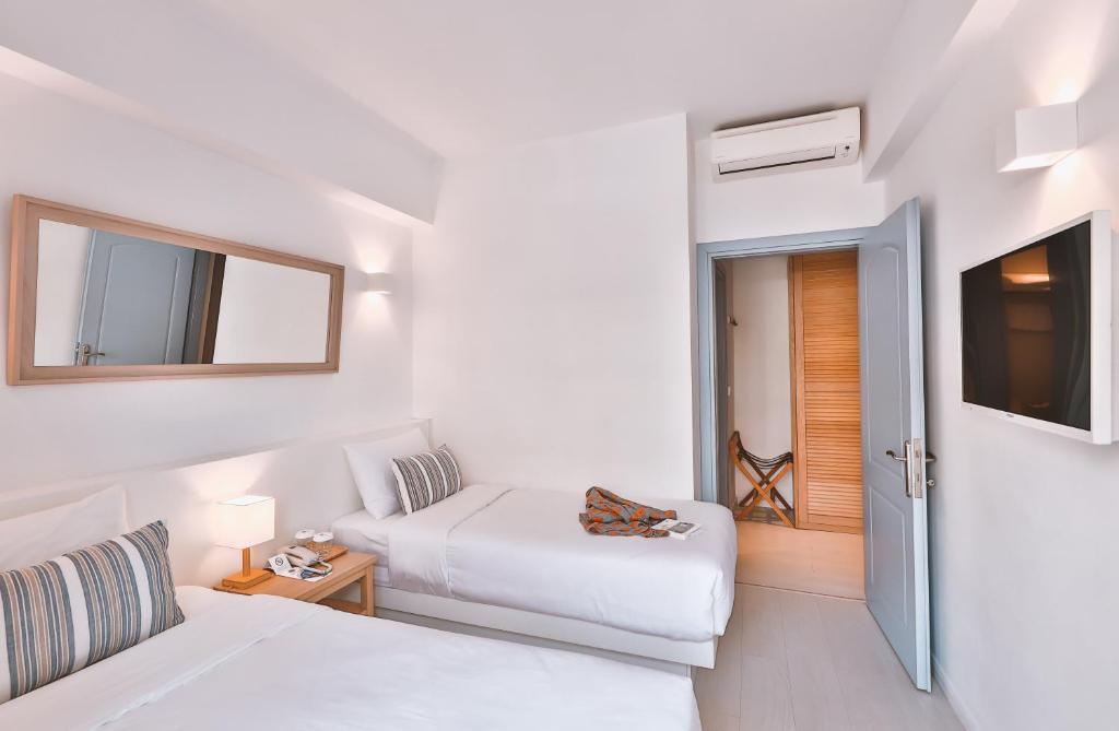 Postel nebo postele na pokoji v ubytování Dias Hotel