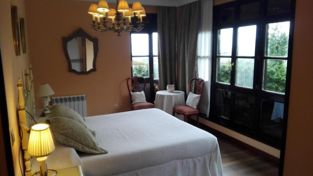 Postel nebo postele na pokoji v ubytování Hotel Rural El Pagadín