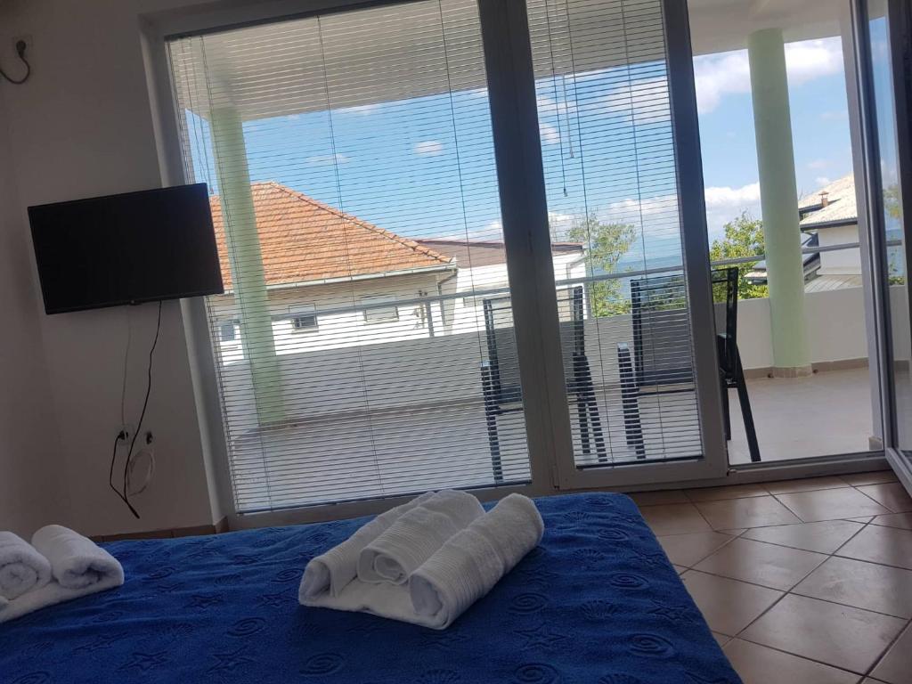 Postel nebo postele na pokoji v ubytování Villa Lana