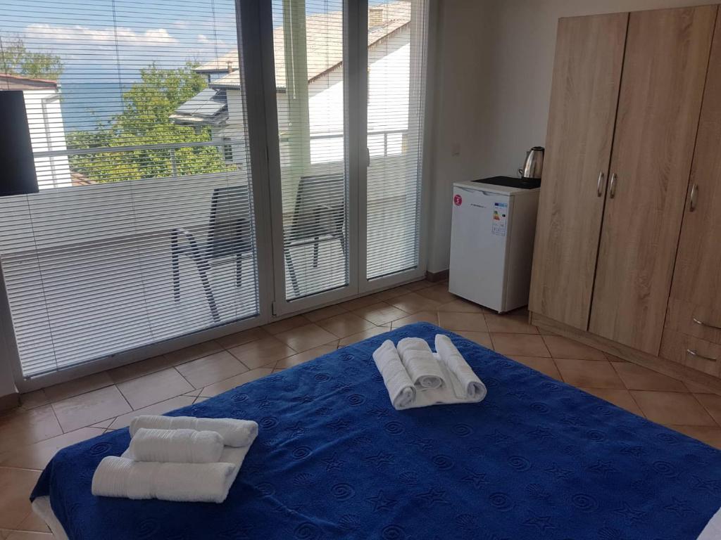 Postel nebo postele na pokoji v ubytování Villa Lana