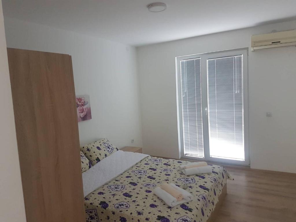 Postel nebo postele na pokoji v ubytování Villa Lana