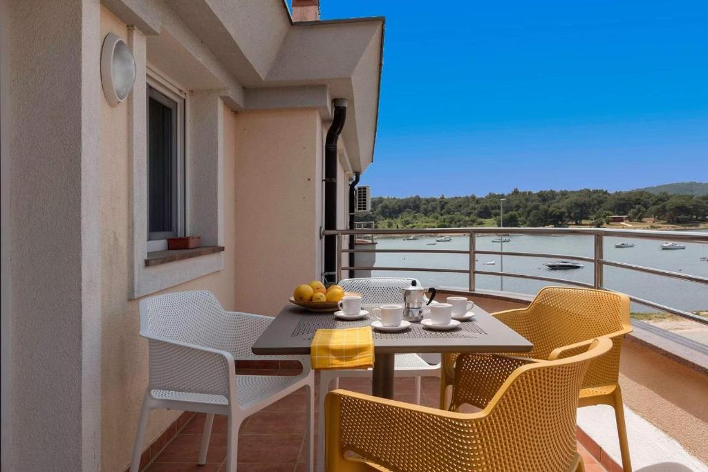 Balkón nebo terasa v ubytování Seafront apartment Gaby