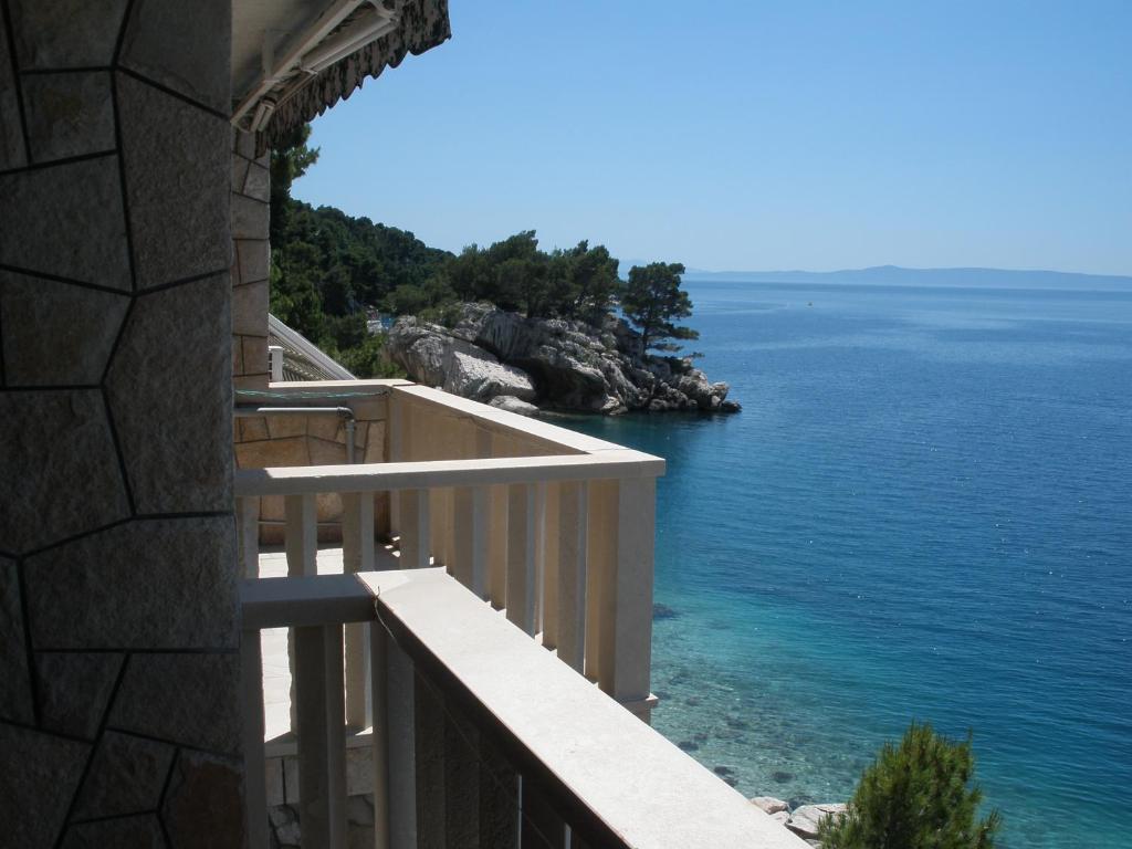 a balcony with a view of the ocean at Villa Victoria in Brela