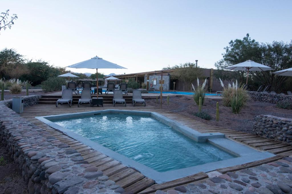 A piscina em ou perto de Hotel Cumbres San Pedro de Atacama
