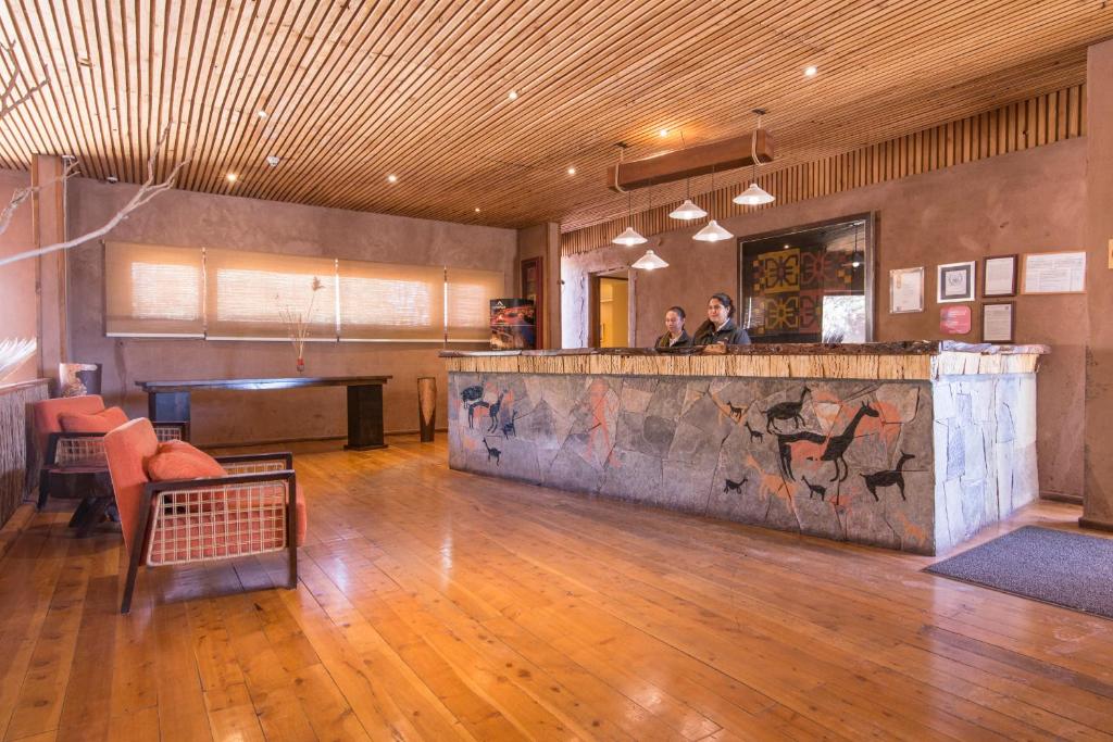 Uma área de estar em Hotel Cumbres San Pedro de Atacama