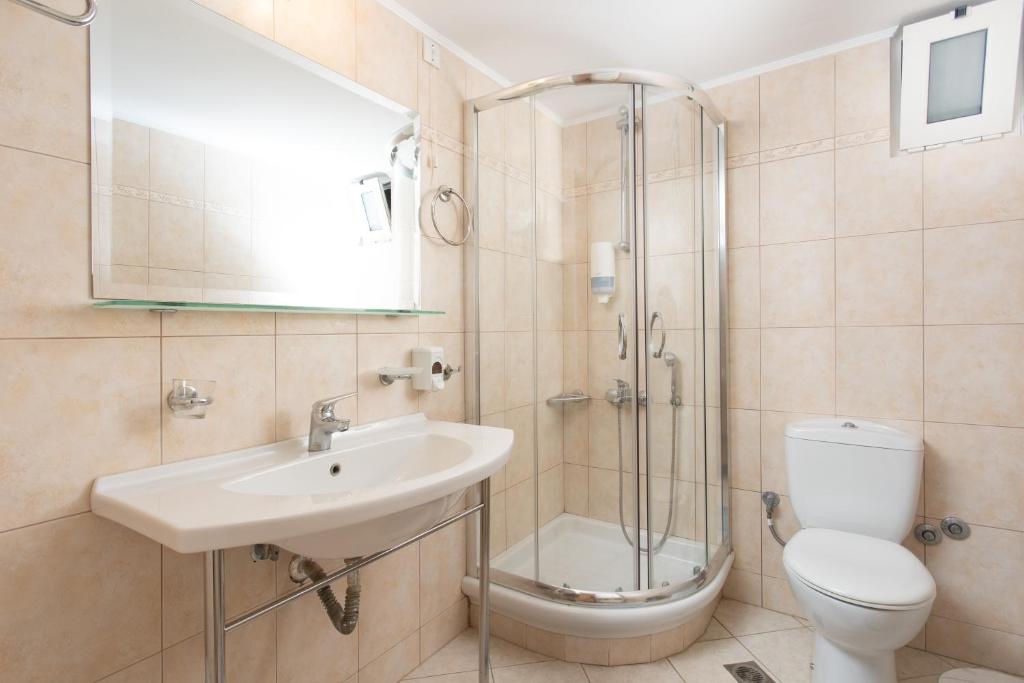 Koupelna v ubytování Pantheon City Hotel