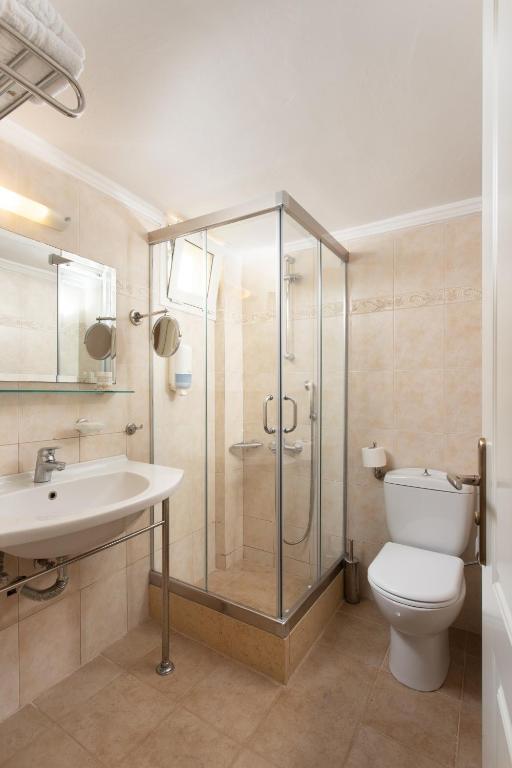 Koupelna v ubytování Pantheon City Hotel
