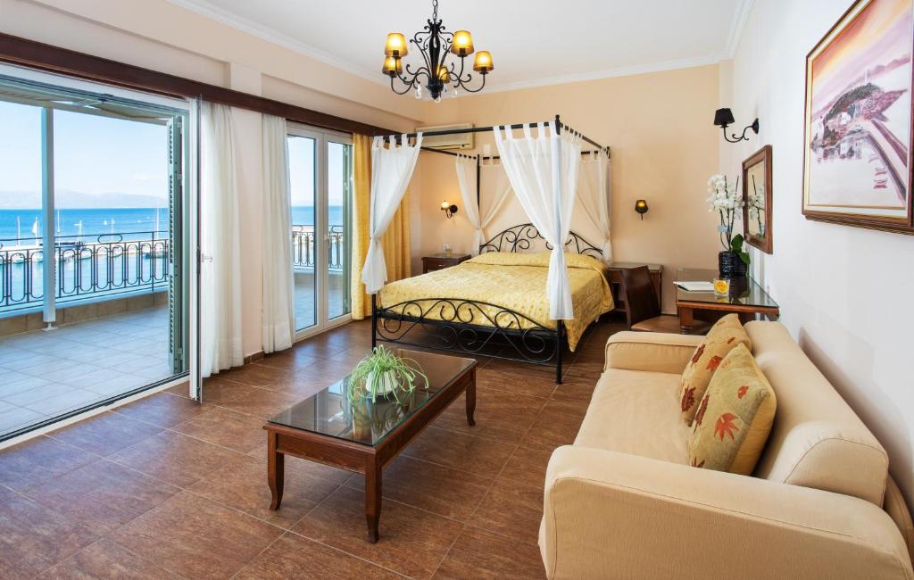 Postel nebo postele na pokoji v ubytování Pantheon City Hotel