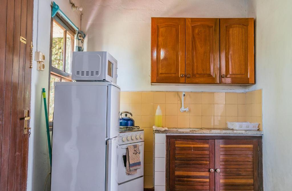 Kuchyň nebo kuchyňský kout v ubytování Cabañas Virazon Aguas Dulces