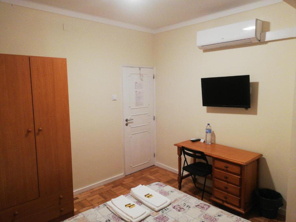 TV a/nebo společenská místnost v ubytování MicroRent Rooms
