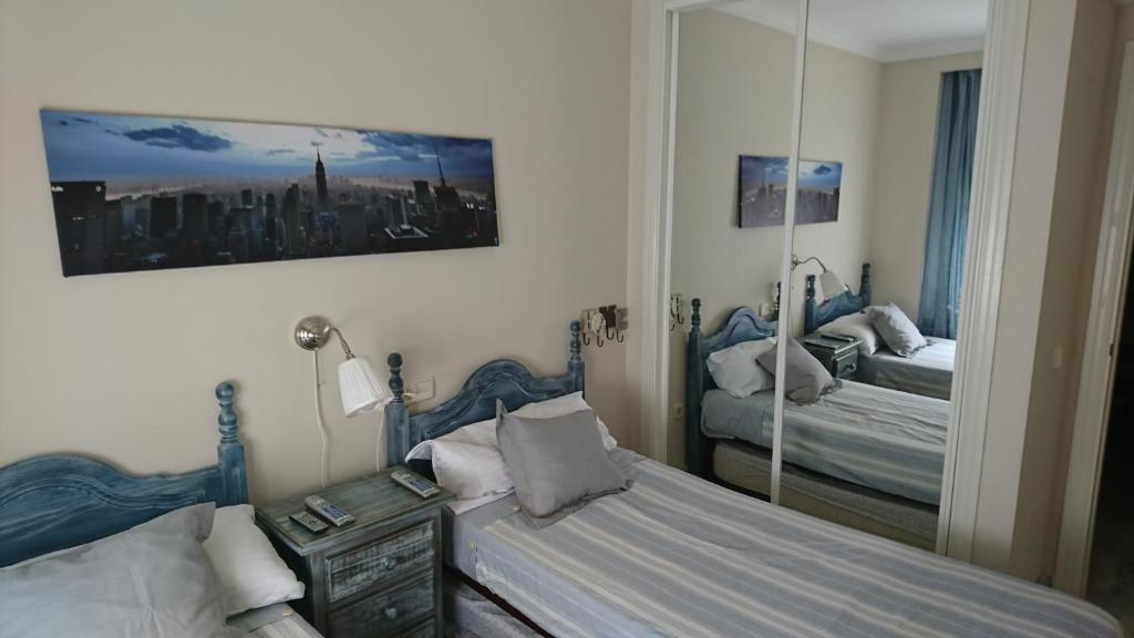 Posteľ alebo postele v izbe v ubytovaní Marbella Puerto Banus Apartamento 2 rooms, 4 personas Bajo con jardin