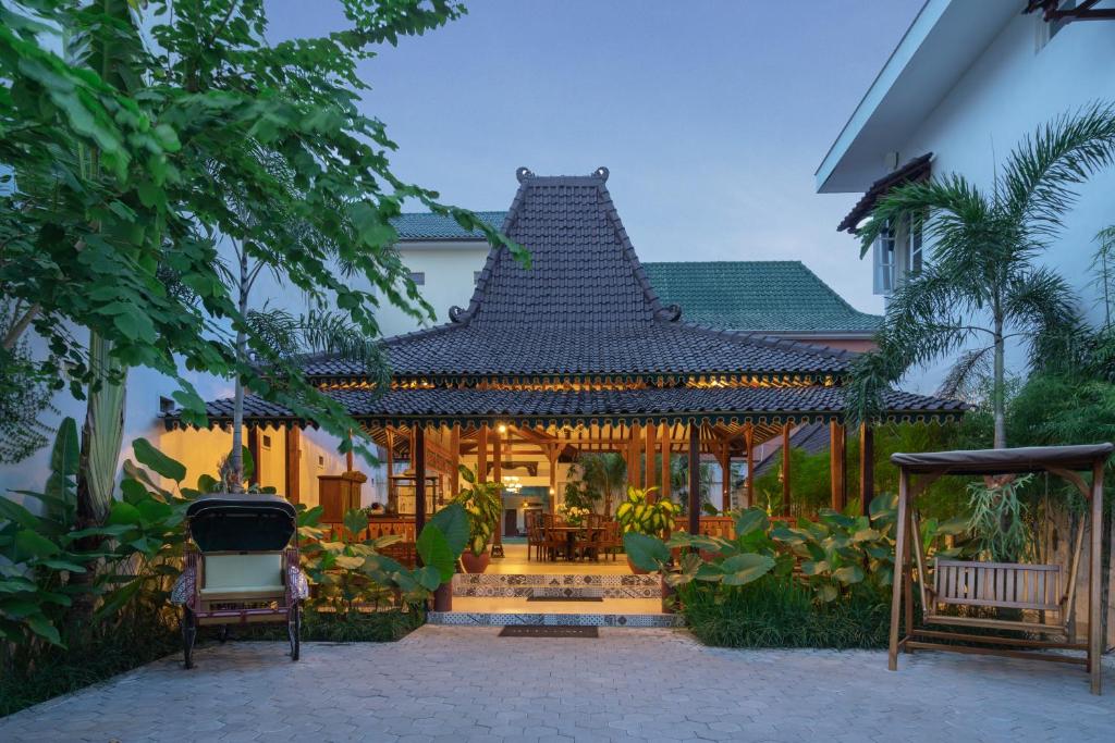 Un jardín fuera de Diana Hotel Jogja