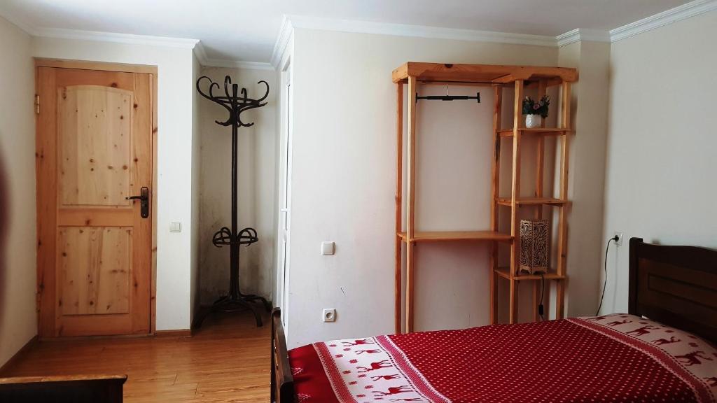 Postel nebo postele na pokoji v ubytování Garden House Mestia