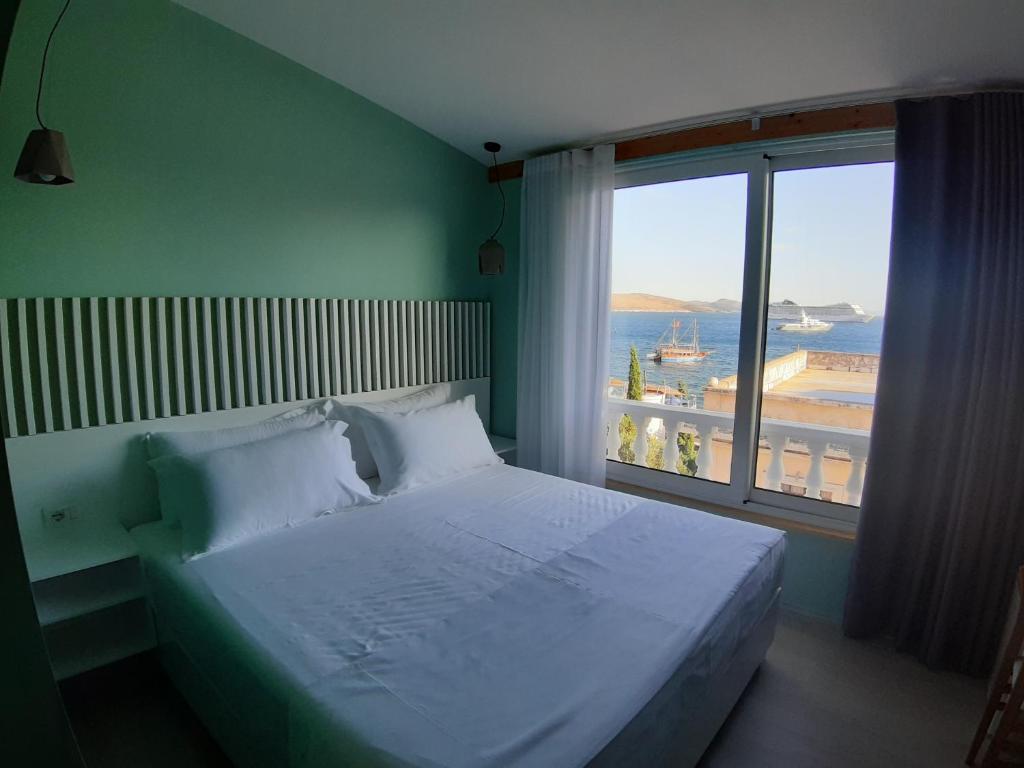 Postel nebo postele na pokoji v ubytování Bistrica Hotel