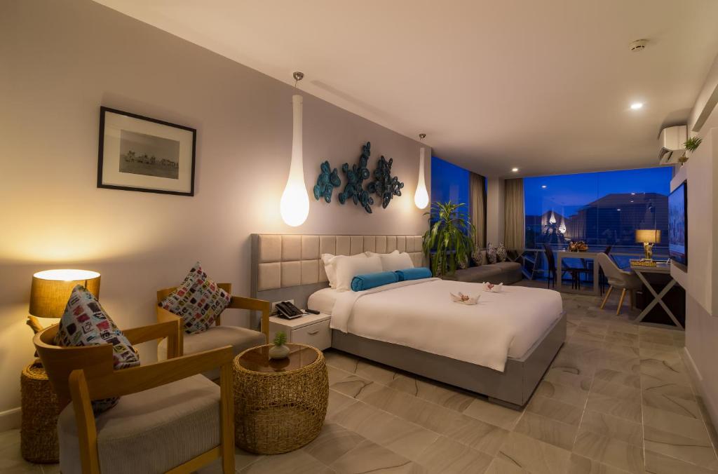 Postel nebo postele na pokoji v ubytování Damrei Residence & Spa