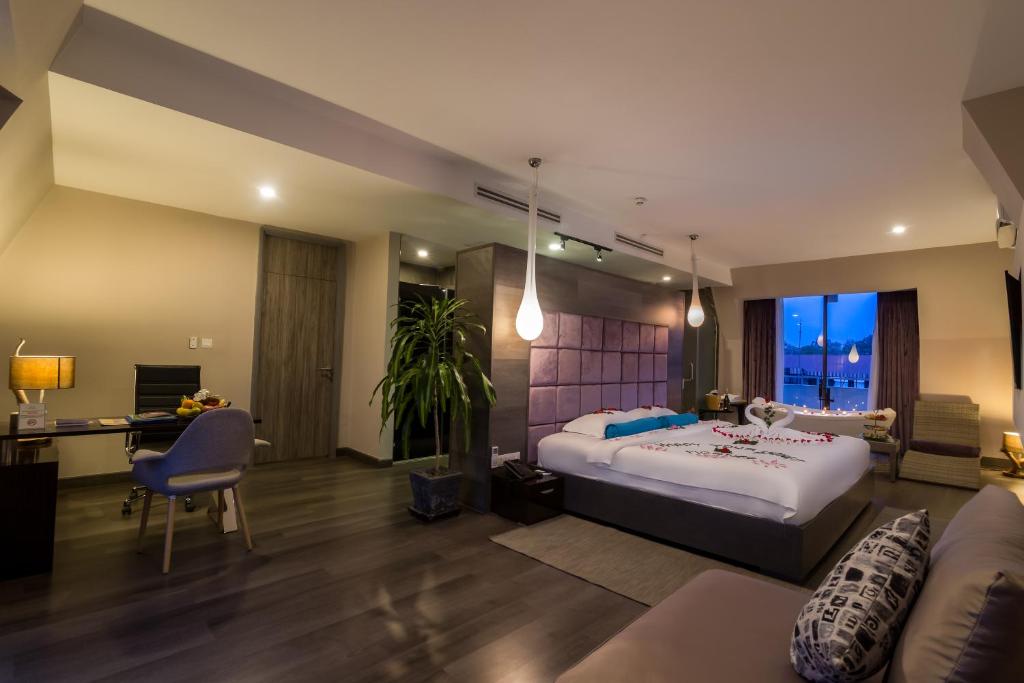 Postel nebo postele na pokoji v ubytování Damrei Residence & Spa