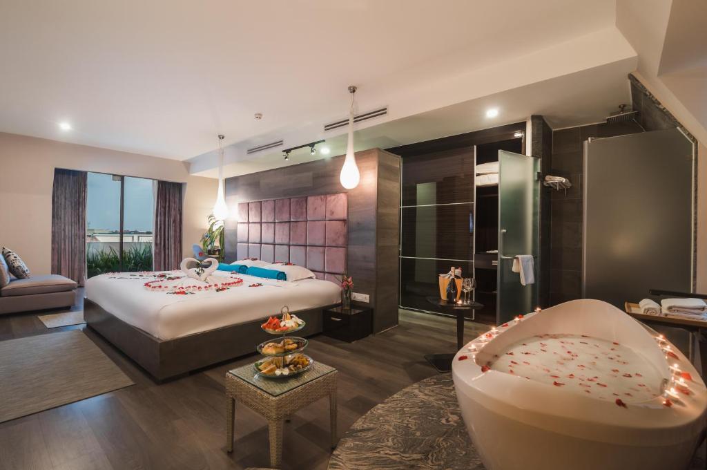 Postel nebo postele na pokoji v ubytování Damrei Residence & Spa