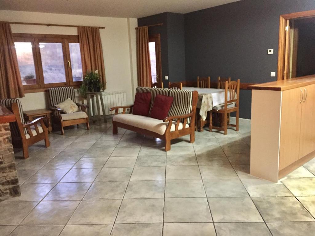 Posezení v ubytování La Fusteria del Casat