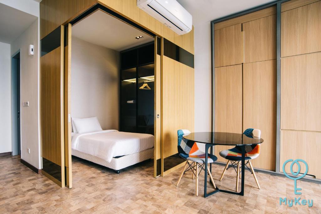 Postel nebo postele na pokoji v ubytování Expressionz Professional Suites by MyKey