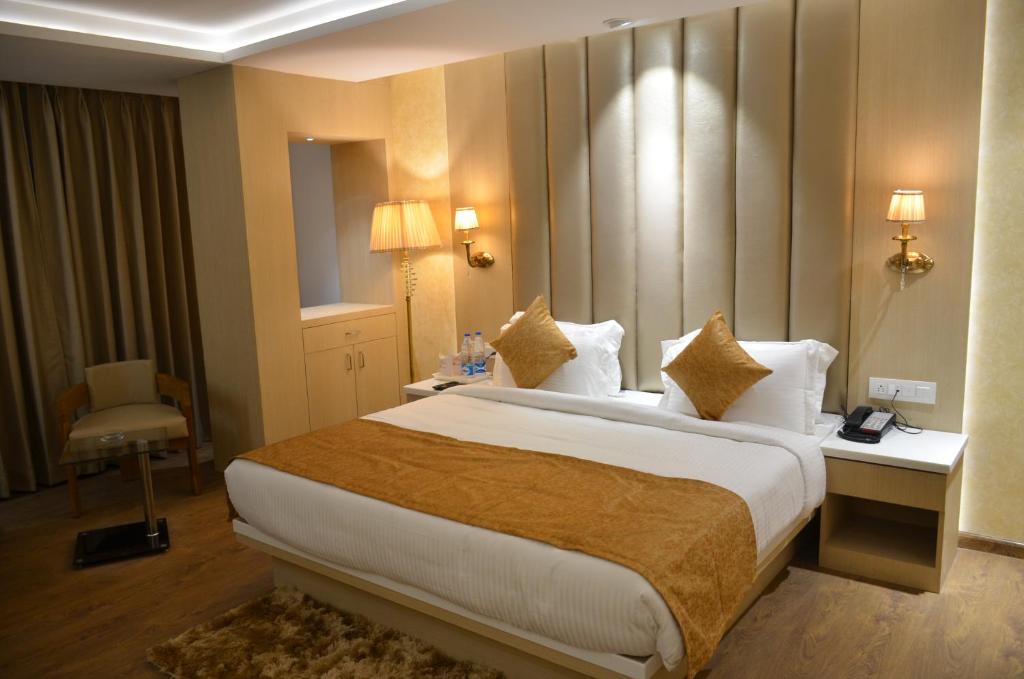Postel nebo postele na pokoji v ubytování Hotel Radiance