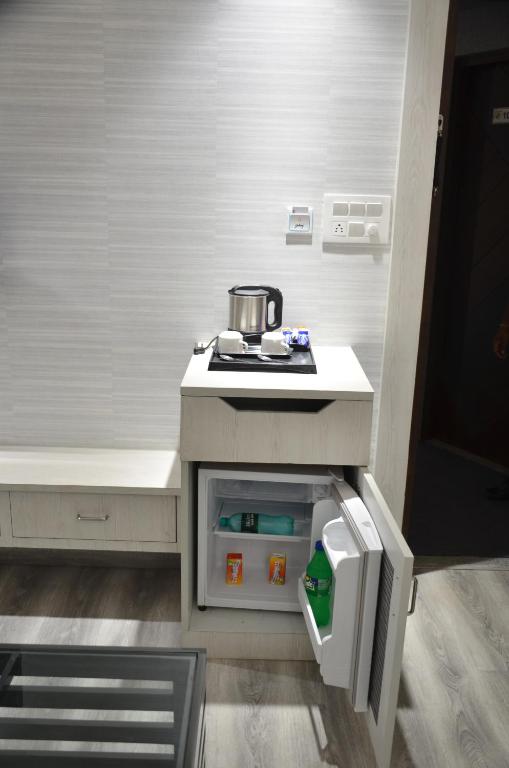 Kuchyň nebo kuchyňský kout v ubytování Hotel Radiance
