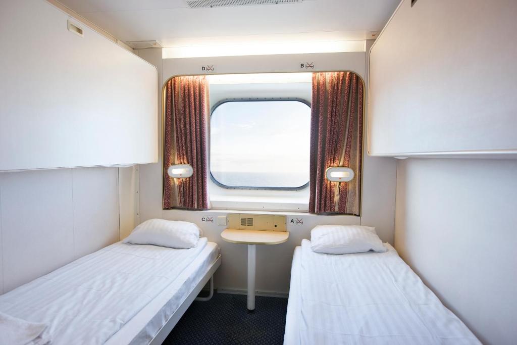 Postel nebo postele na pokoji v ubytování DFDS Ferry - Copenhagen to Oslo