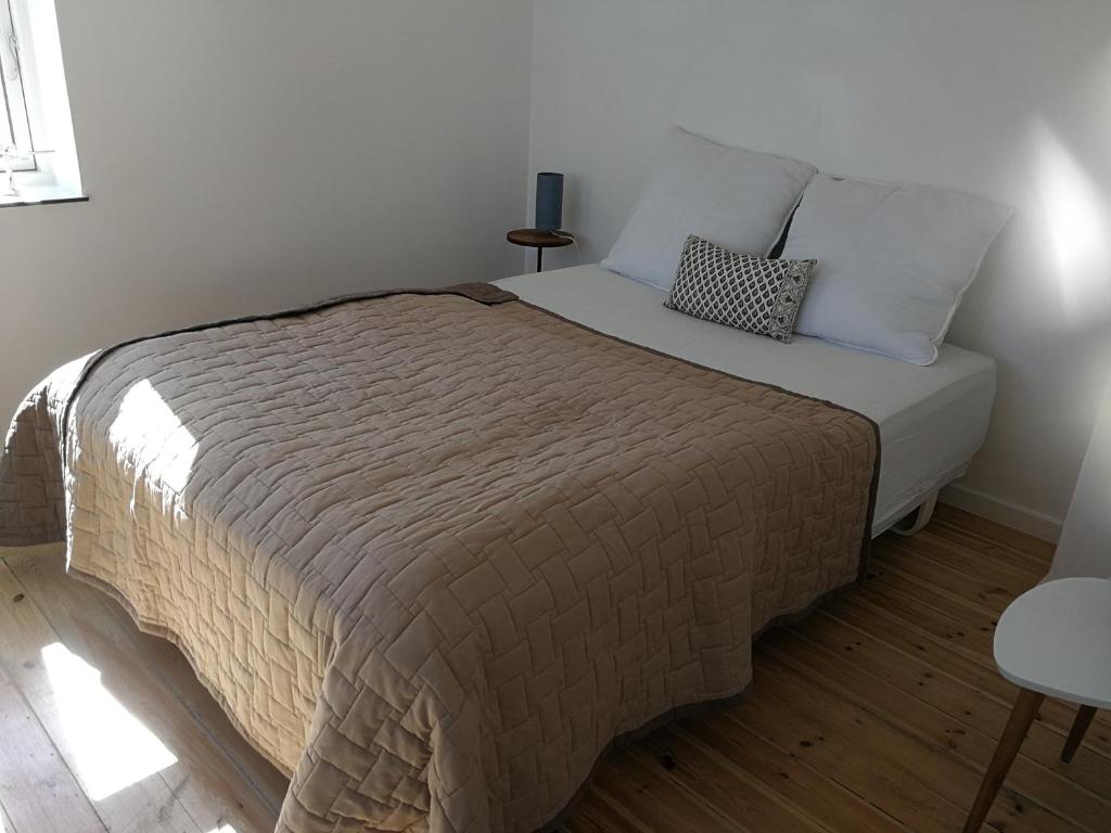 Postel nebo postele na pokoji v ubytování Bønnerup Strand