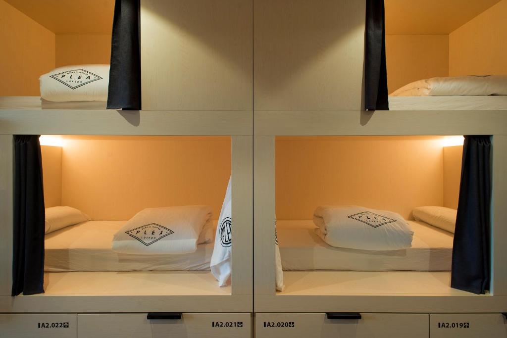 Postel nebo postele na pokoji v ubytování Plea Beach House