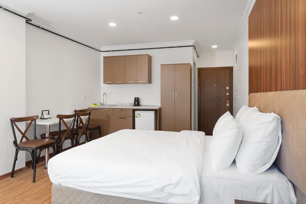 Kuchyň nebo kuchyňský kout v ubytování Modern Suites
