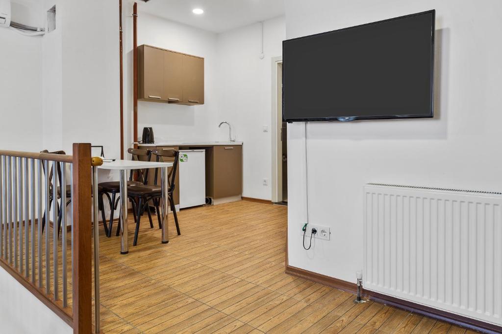 TV a/nebo společenská místnost v ubytování Modern Suites