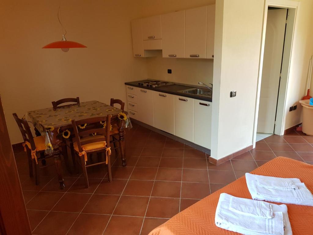 Kuchyňa alebo kuchynka v ubytovaní Villaggio Turistico Airone