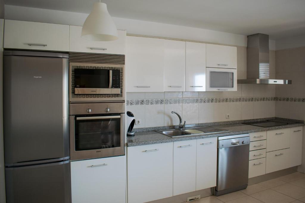 A kitchen or kitchenette at Lajas De Chapin FREE WIFI