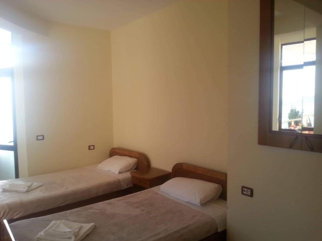 Postel nebo postele na pokoji v ubytování Hotel Saint Marena