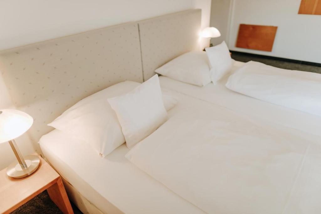Huber's Hotelにあるベッド