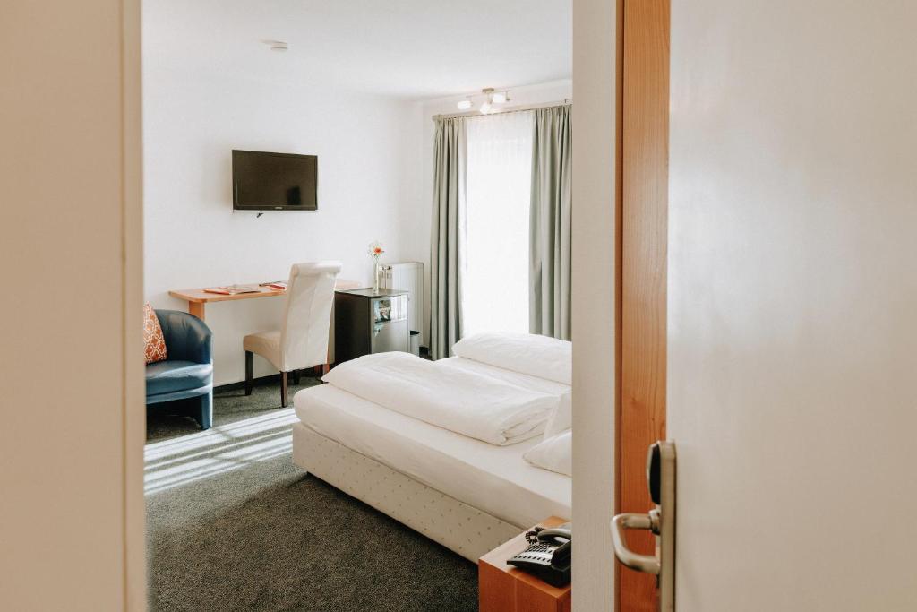 Huber's Hotelにあるベッド