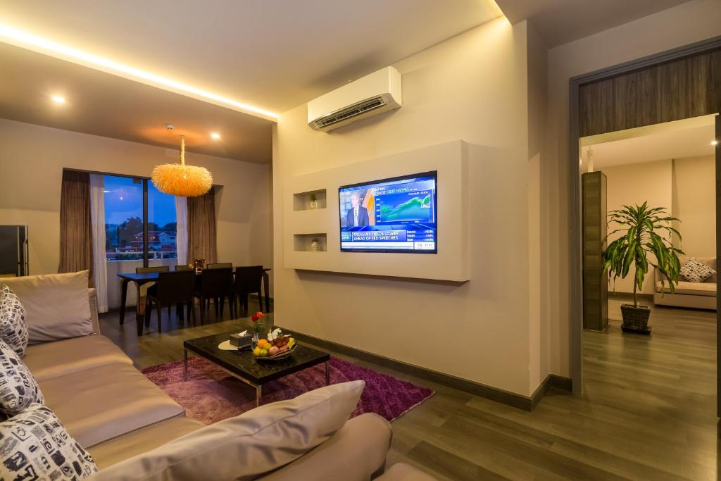 TV a/nebo společenská místnost v ubytování Damrei Angkor Hotel