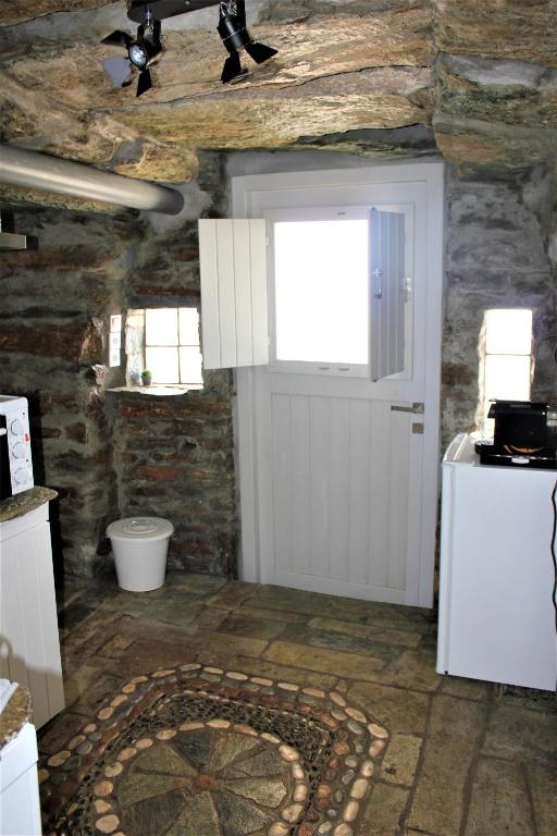 Kuchyň nebo kuchyňský kout v ubytování Gaia Vacation Home
