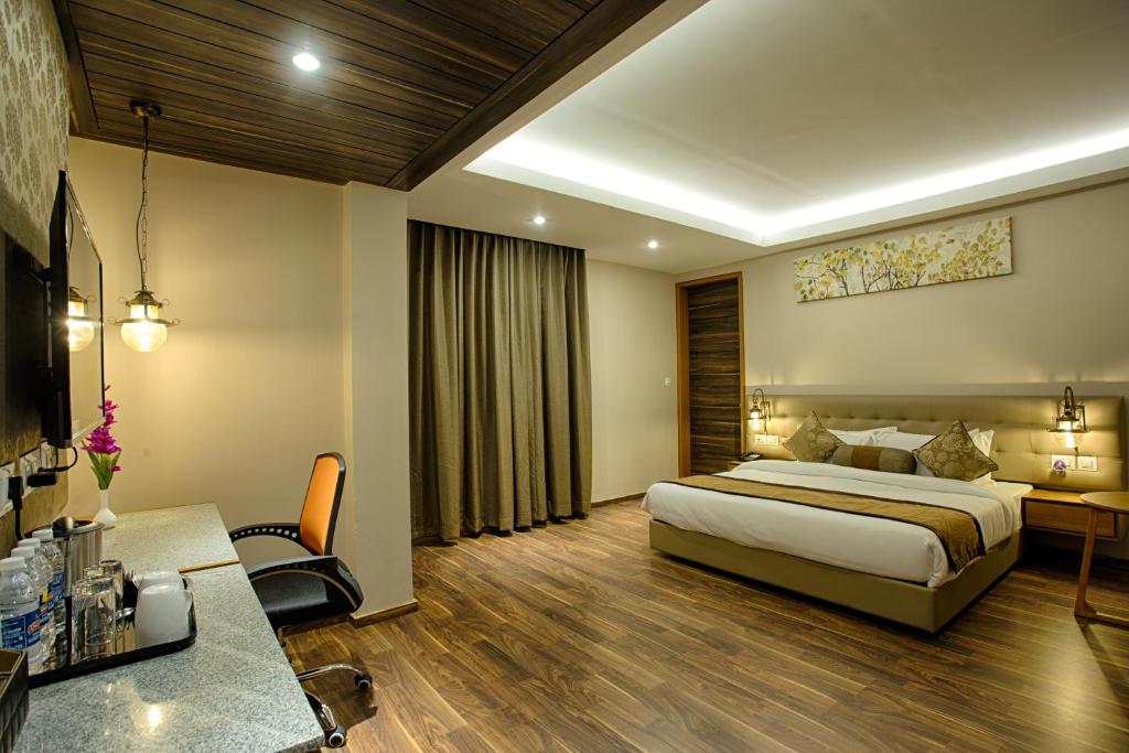 Postel nebo postele na pokoji v ubytování Four Vedas Hotel & Resort