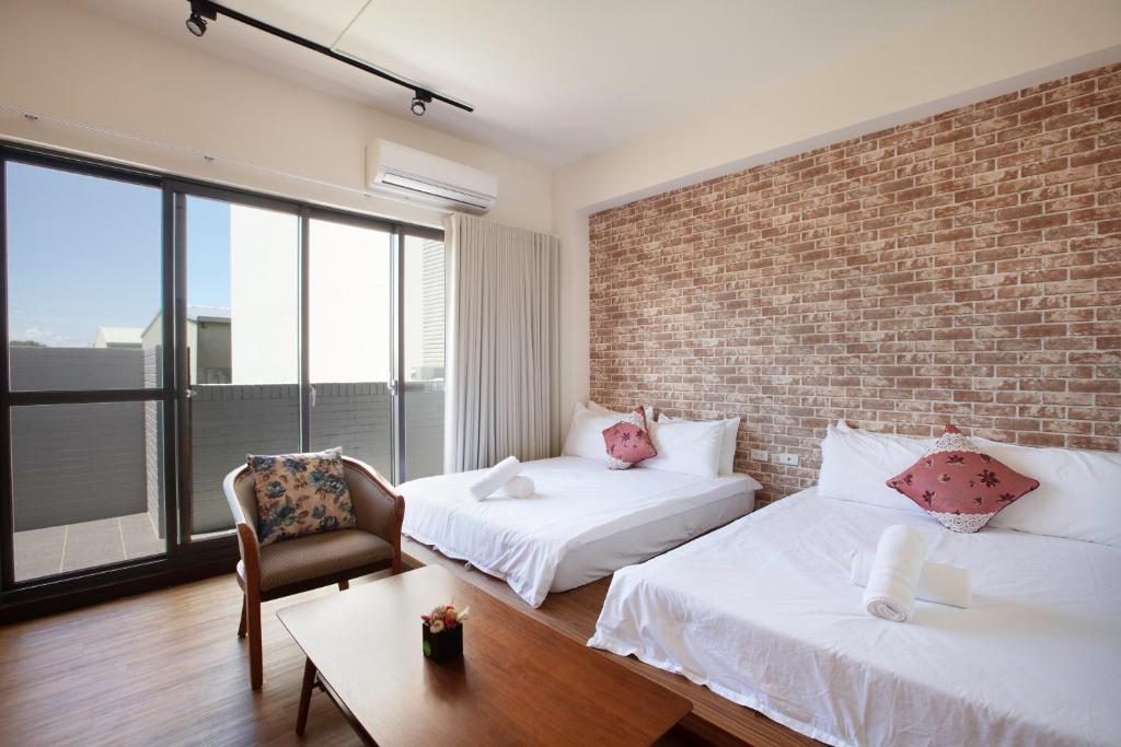 黑琵軼棧湖濱旅宿 K&B Happy Hostel房間的床