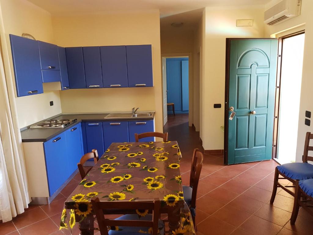 Kuchyňa alebo kuchynka v ubytovaní Villaggio Turistico Airone