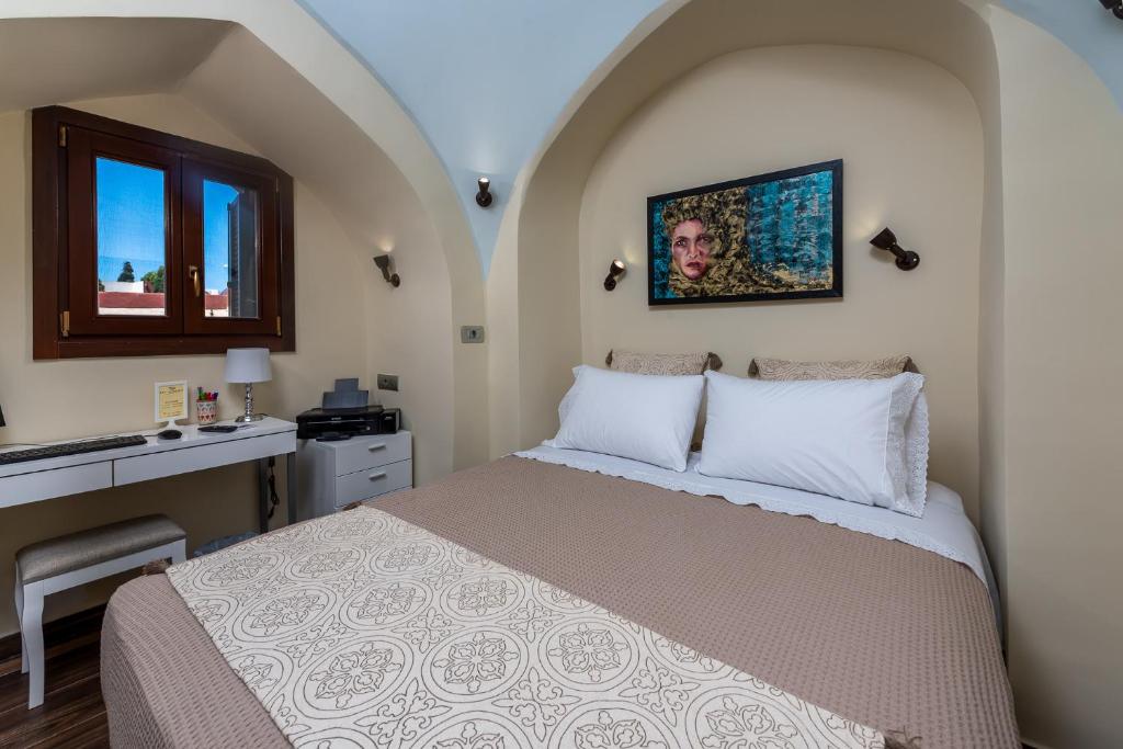 A bed or beds in a room at BIBLIOTHEQUE