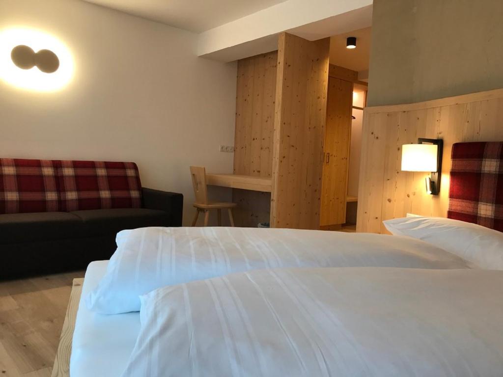 Postel nebo postele na pokoji v ubytování Hotel Schoenblick