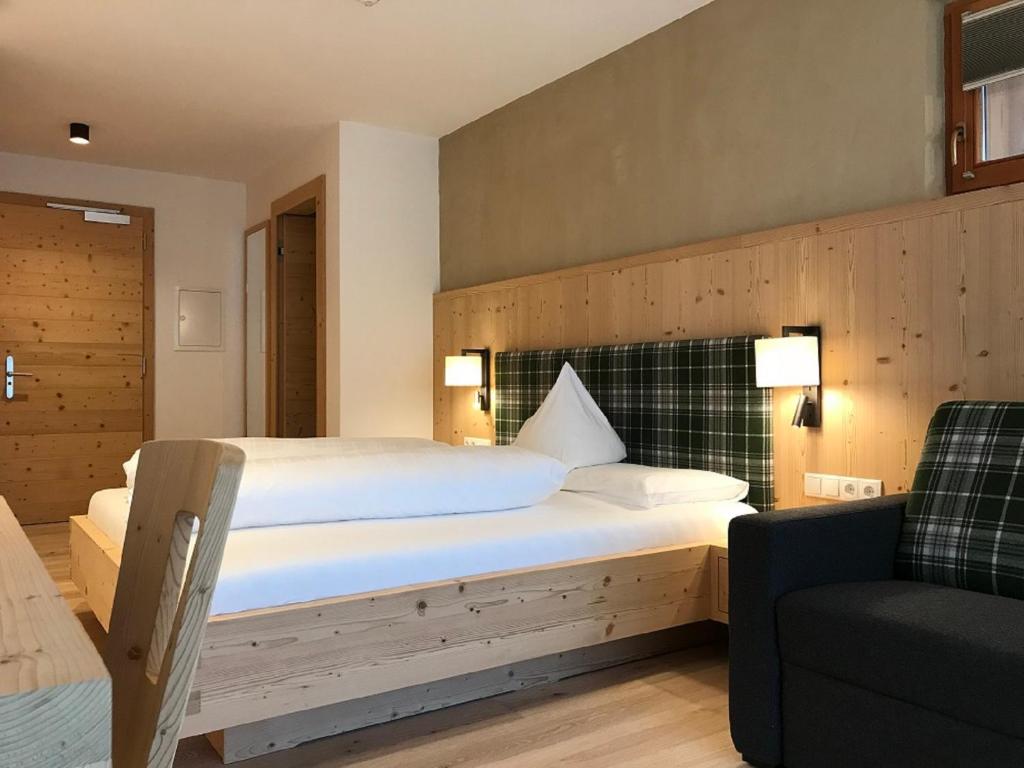 Postel nebo postele na pokoji v ubytování Hotel Schoenblick