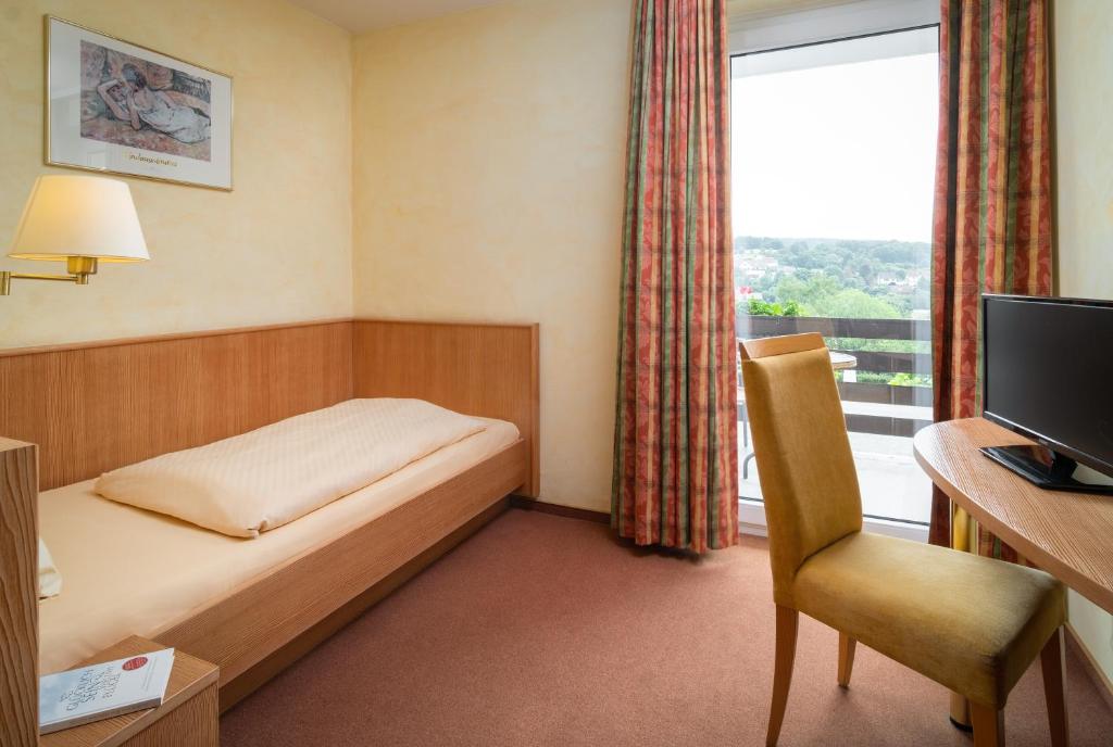 TV a/nebo společenská místnost v ubytování AKZENT Hotel Haus Sonnenberg