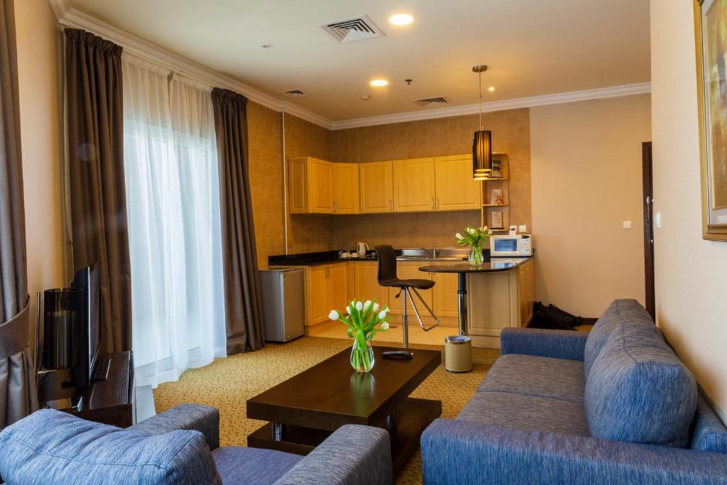 Kuchyň nebo kuchyňský kout v ubytování Kingsgate Hotel Doha by Millennium Hotels