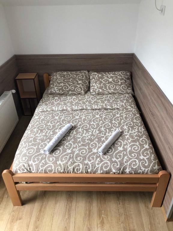 Postel nebo postele na pokoji v ubytování Vila Zlatarka