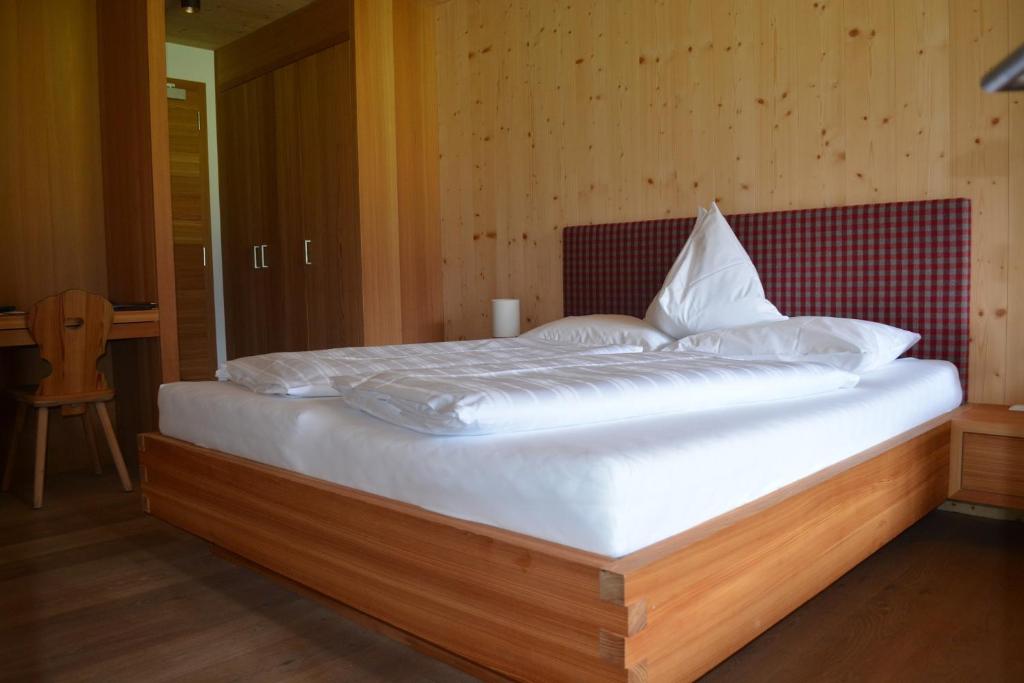 Postel nebo postele na pokoji v ubytování Hotel Schoenblick